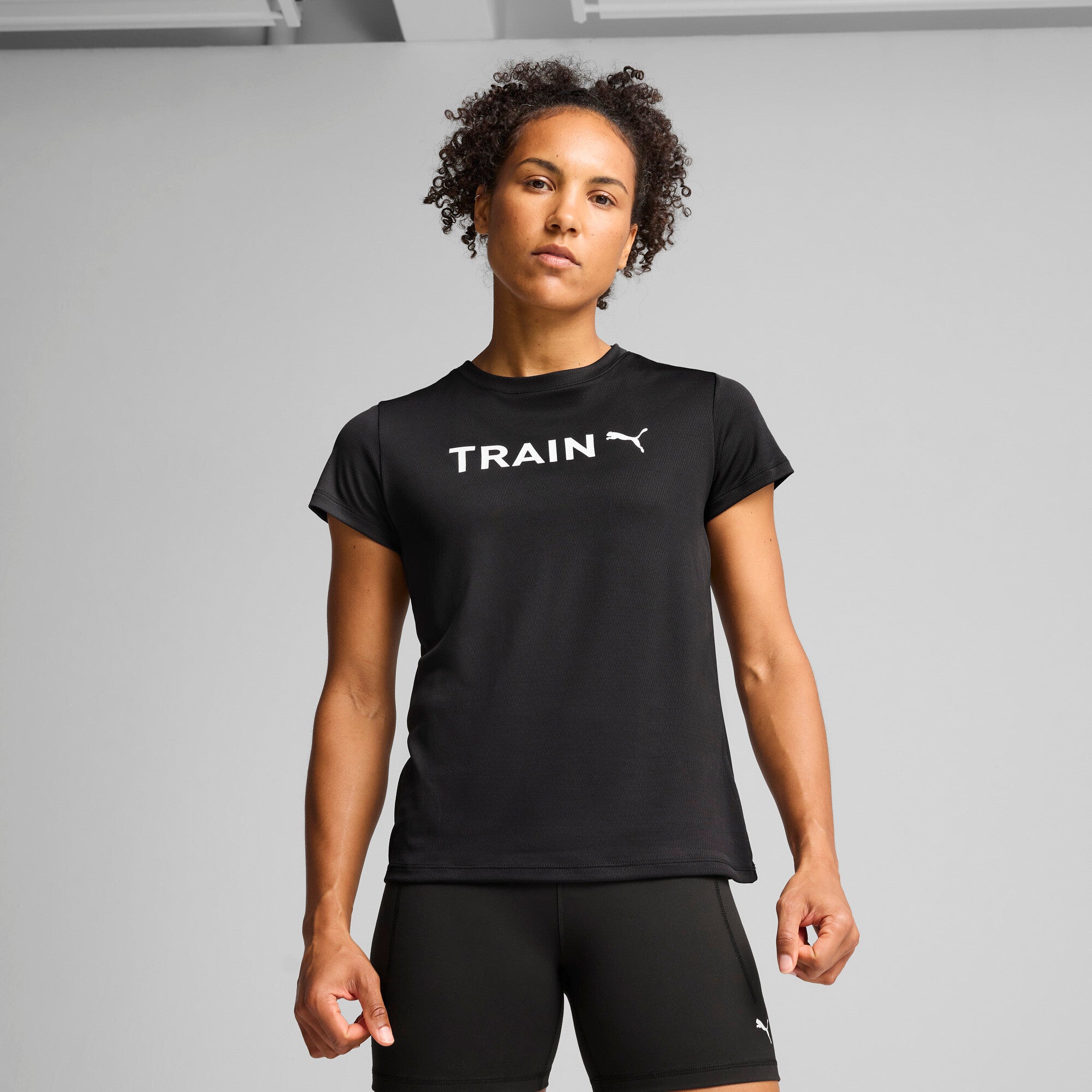 Puma graphics puma training tee in black - Model Shot 01