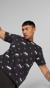 Puma essentials+ logo power printed tee men in black - Model Shot 03