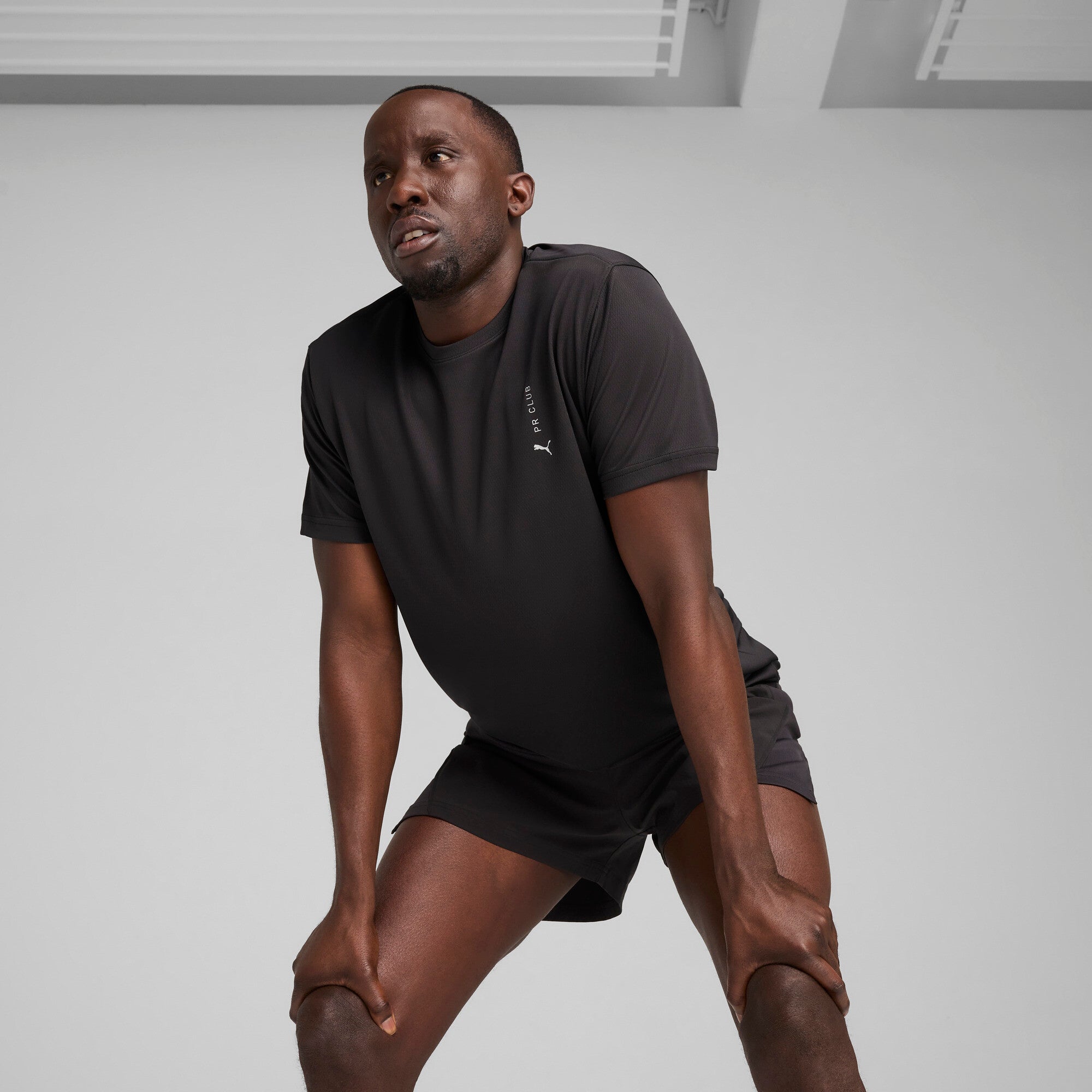 Puma graphic running tee in black - Model Shot 01