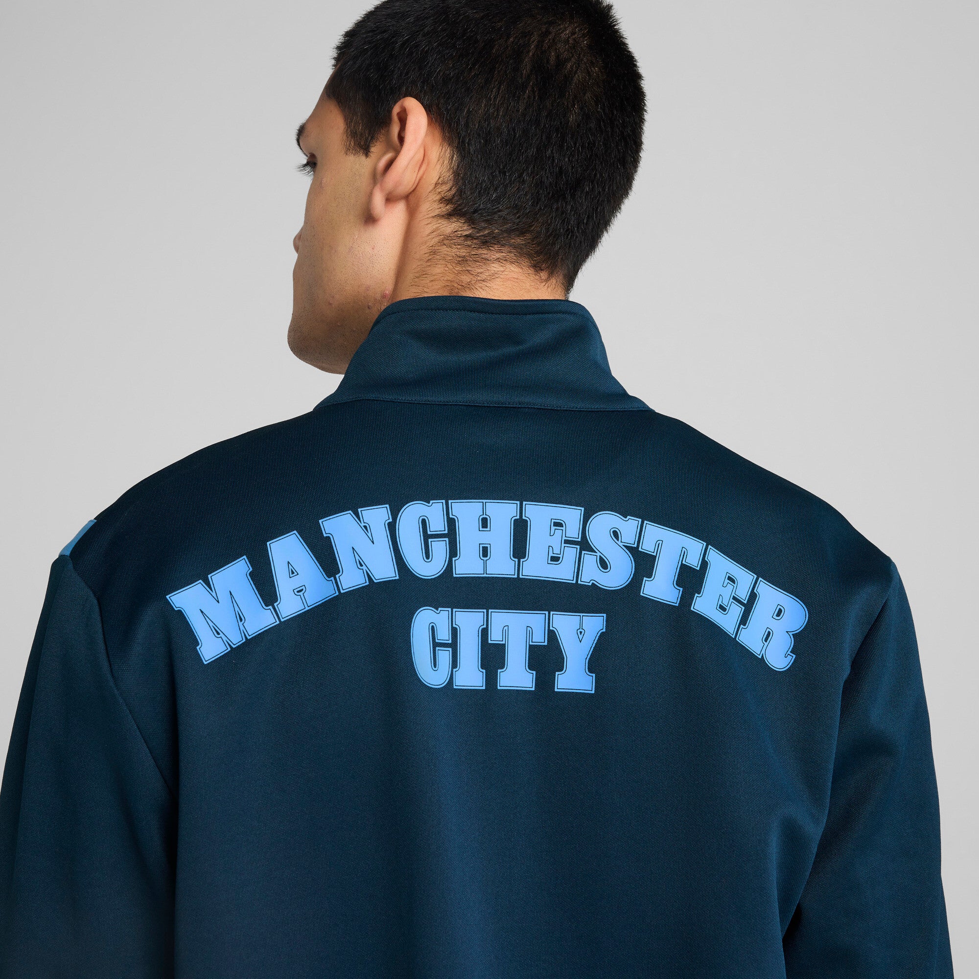 Puma manchester city ftblNRGY+ jacket in marine blue and blazing blue - Model Shot 02