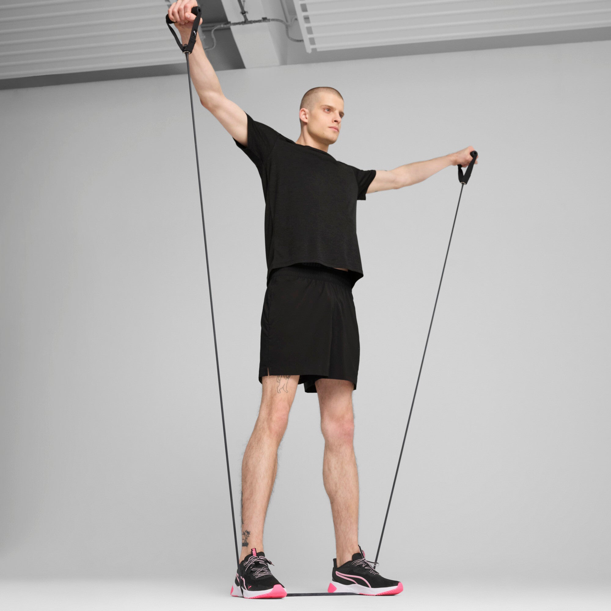 PUMA TAD ESSENTIALS heather cat tee men in black heather — model shot 3