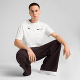 Puma F1® ESS+ relaxed graphic tee in white - Model Shot 03
